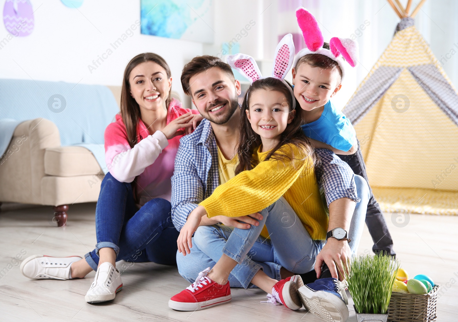 Photo of Happy family spending time together during Easter holiday at home