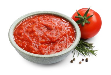 Photo of Homemade tomato sauce in bowl and fresh ingredients isolated on white