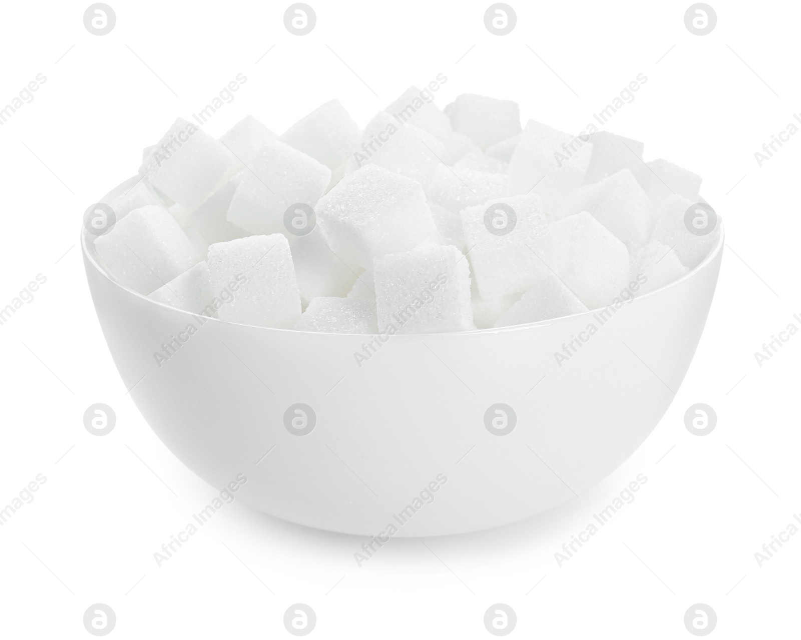 Photo of Sugar cubes in bowl isolated on white
