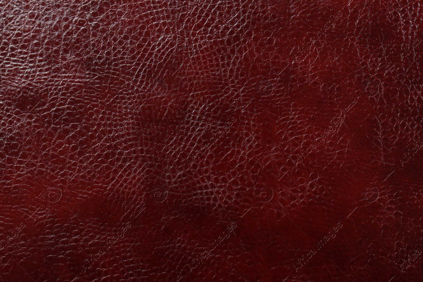 Photo of Beautiful red leather as background, top view