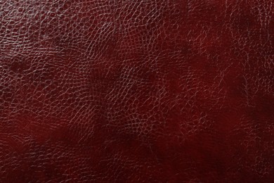 Beautiful red leather as background, top view