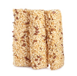 Photo of Tasty sesame seed bars isolated on white
