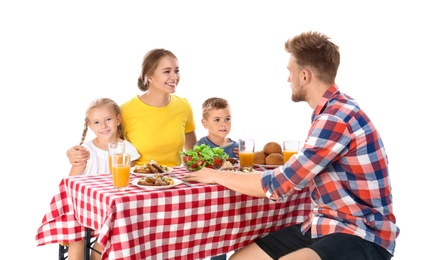 Photo of Happy family having picnic at table on white background