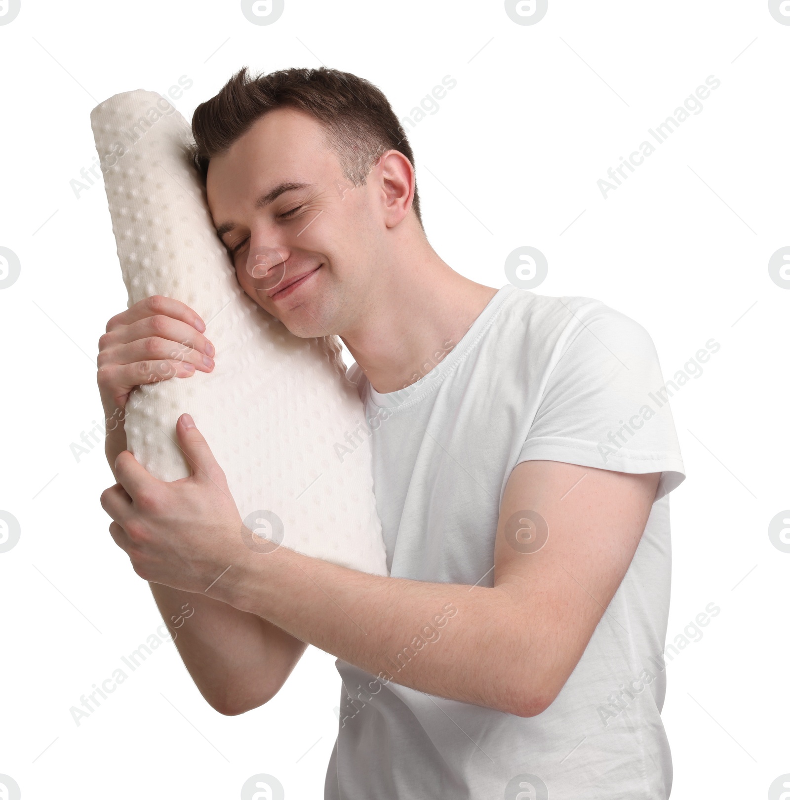 Photo of Man with orthopedic pillow on white background