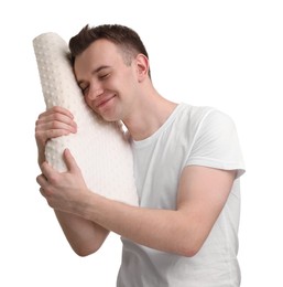 Photo of Man with orthopedic pillow on white background