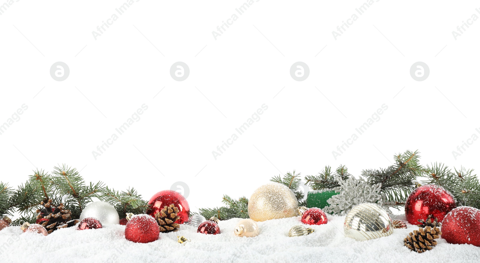 Photo of Fir branches, Christmas decoration and snow against white background