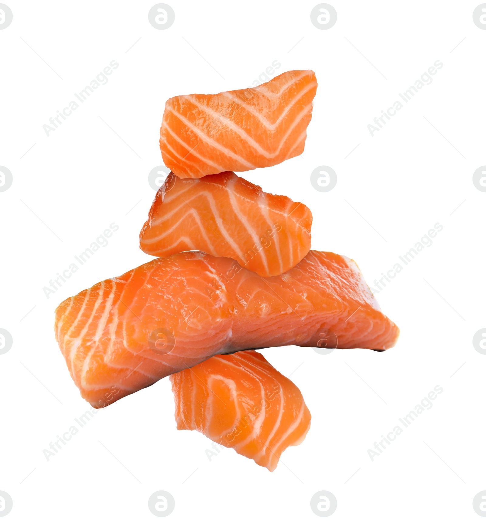 Image of Cut fresh salmon falling on white background