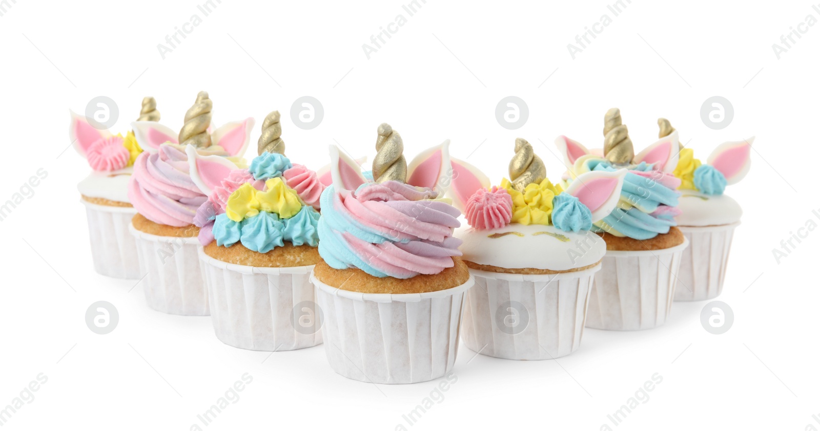 Photo of Many cute sweet unicorn cupcakes on white background