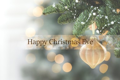 Image of Happy Christmas Eve, postcard design. Beautiful bauble hanging on fir tree against blurred festive lights 