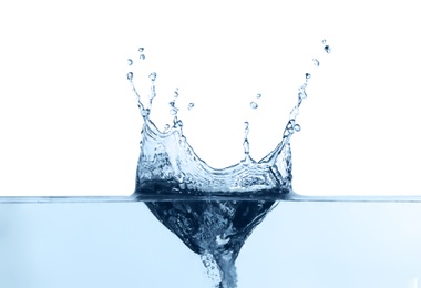 Photo of Splash of pure water on white background, closeup
