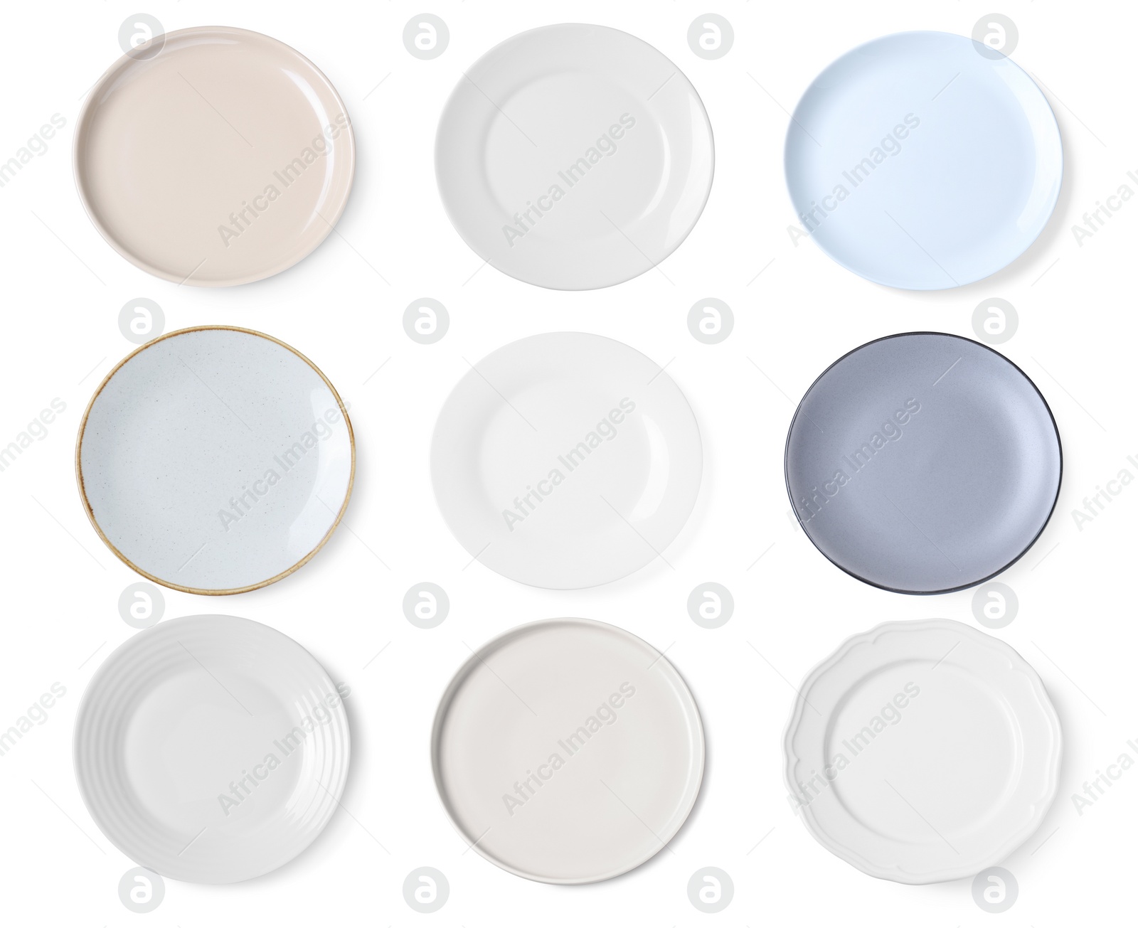Image of Set of different ceramic plates on white background, top view