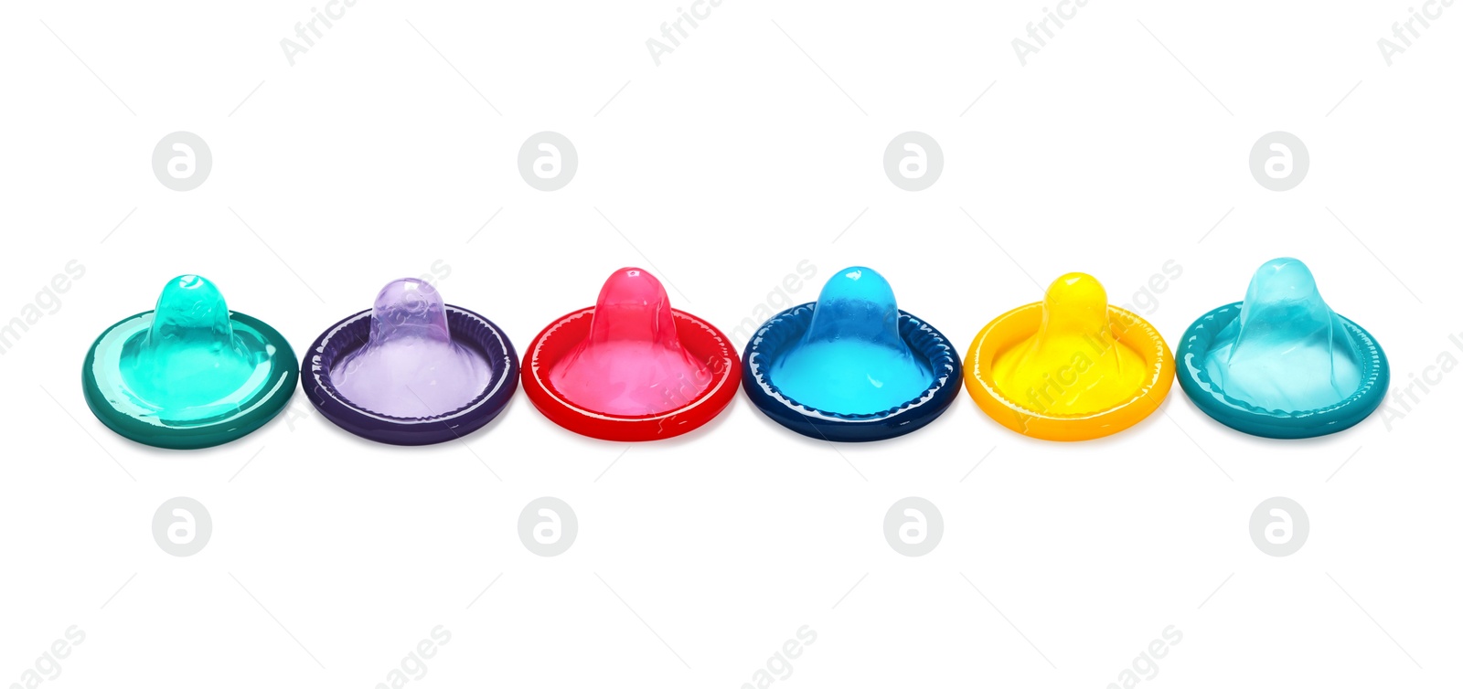 Photo of Colorful condoms isolated on white. Safe sex