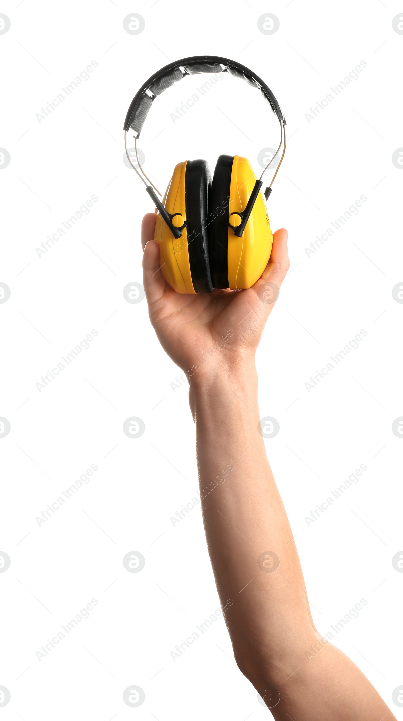Photo of Construction worker holding safety headphones isolated on white