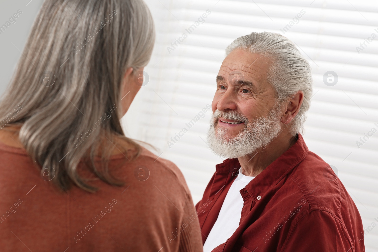 Photo of Happy senior couple spending time together at home