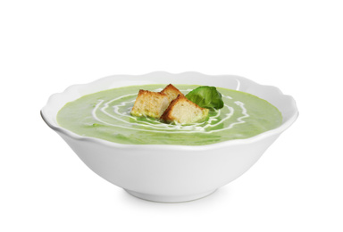 Photo of Delicious broccoli cream soup with croutons isolated on white