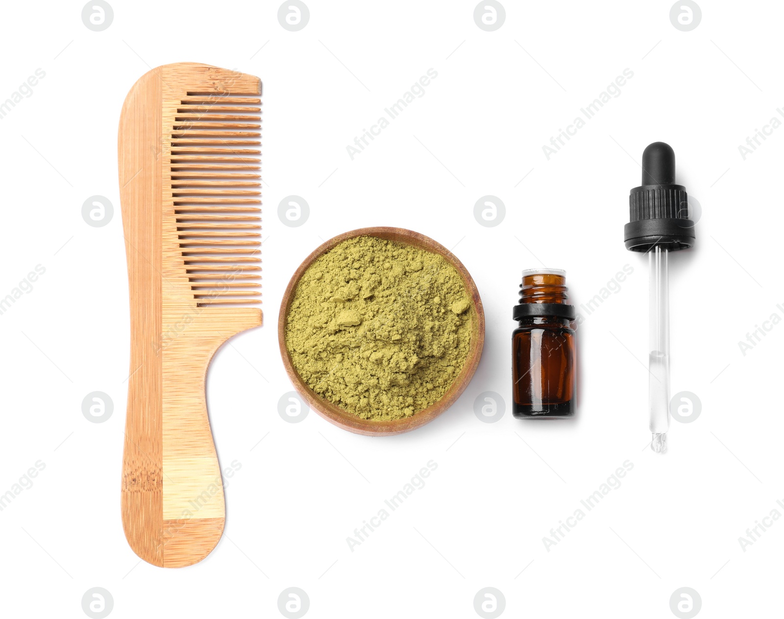 Photo of Henna powder in bowl, bottle, dropper and comb isolated on white, top view