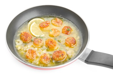 Photo of Delicious scallops with sauce in frying pan isolated on white