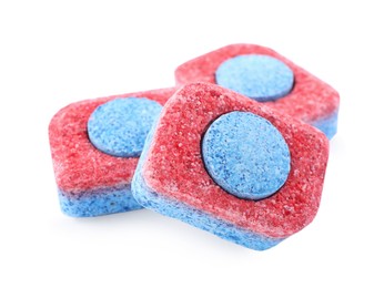 Photo of Many dishwasher detergent tablets on white background