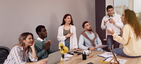 Group of coworkers together in office. Banner design