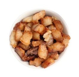 Tasty fried cracklings in bowl on white background, top view. Cooked pork lard