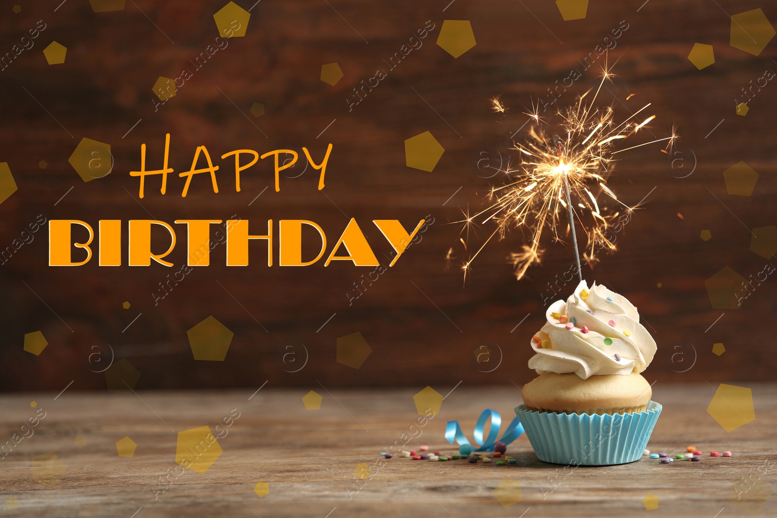 Image of Text Happy Birthday and delicious cupcake with sparkler on blurred background