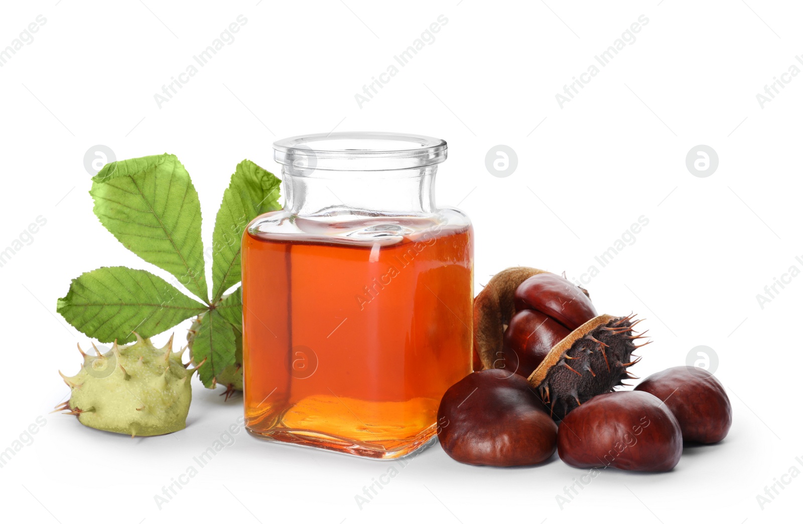Photo of Horse chestnuts, bottle of tincture and green leaf on white background