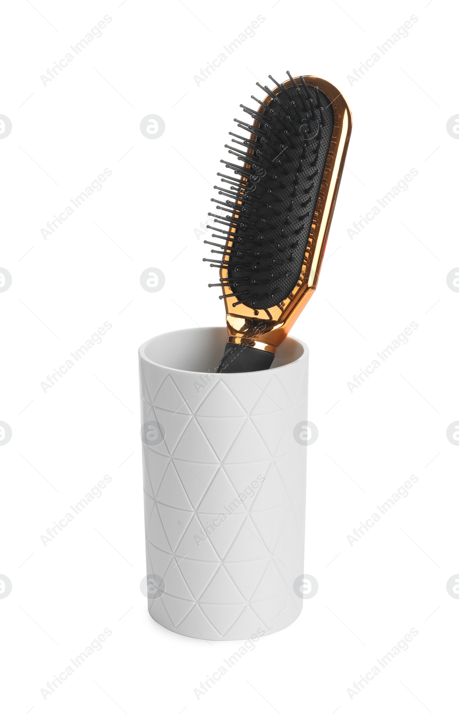Photo of Modern hair brush in holder isolated on white