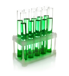 Photo of Test tubes with green liquid on white background