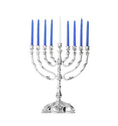 Photo of Menorah with burning candles isolated on white. Hanukkah symbol