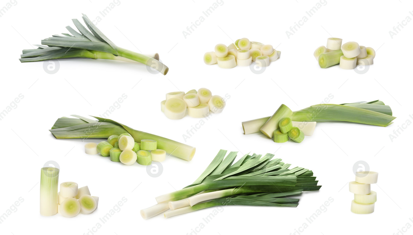 Image of Set with fresh raw leeks on white background