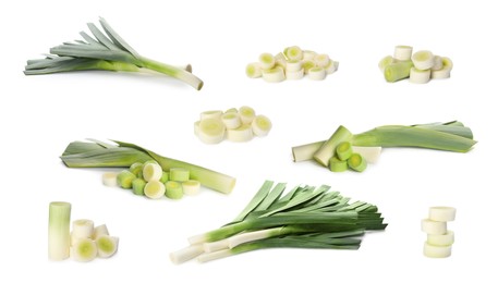 Image of Set with fresh raw leeks on white background