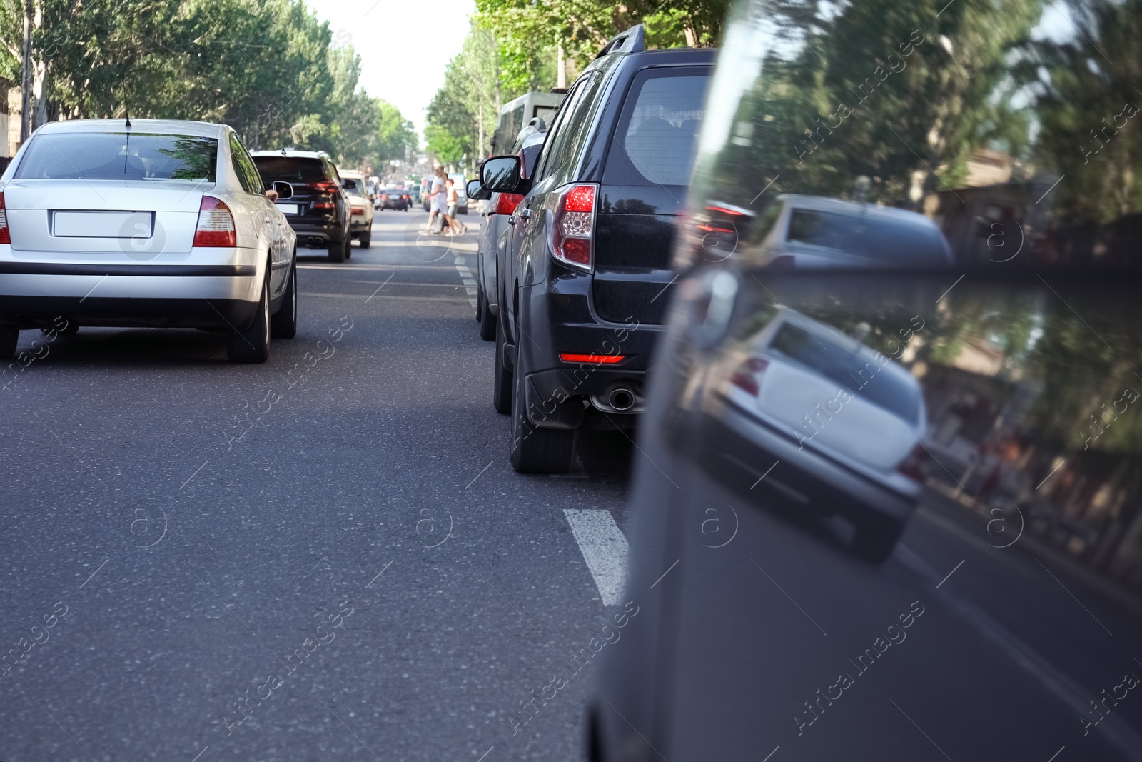 Photo of Cars in traffic jam on city street