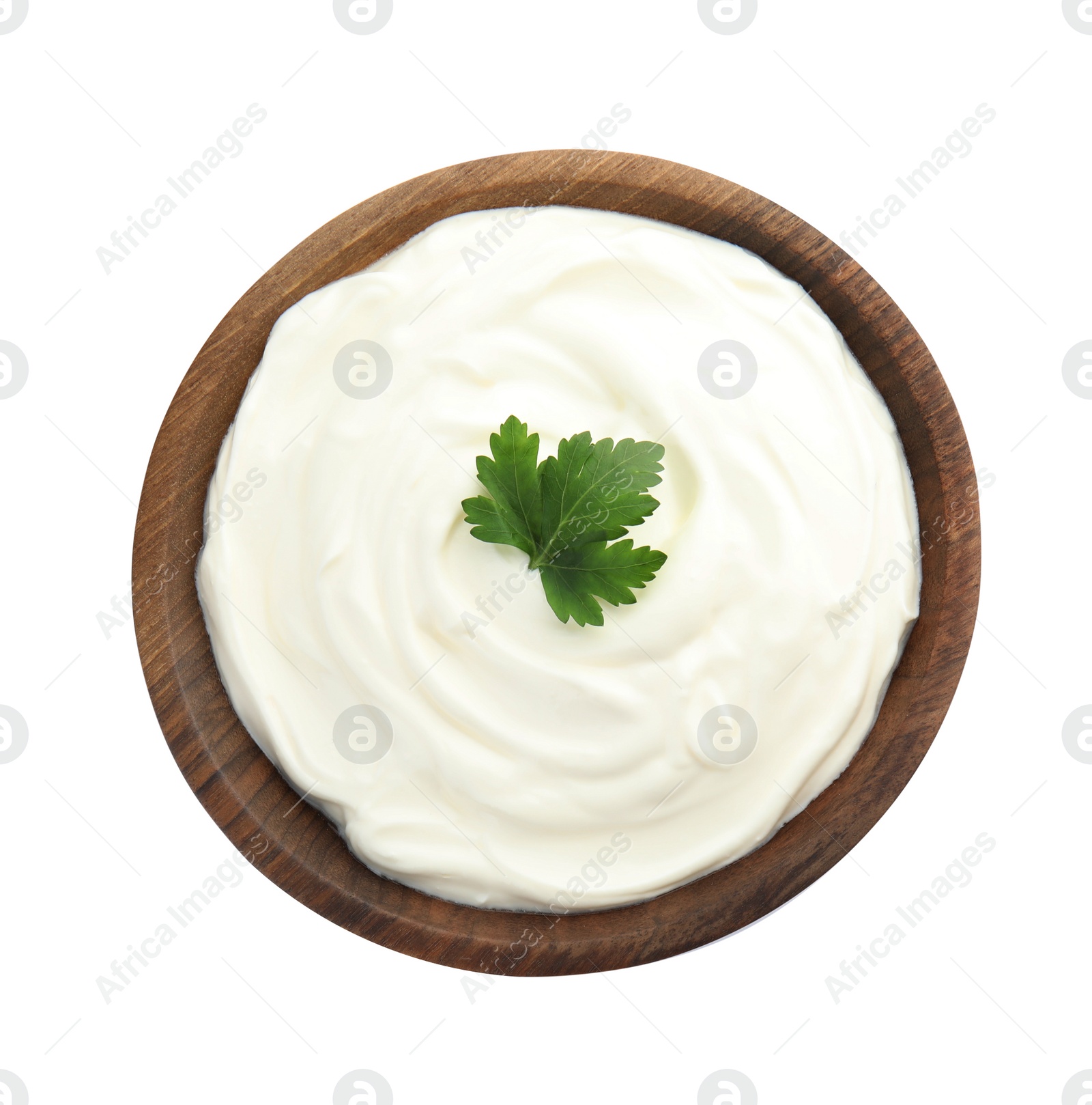 Photo of Bowl with sour cream and herbs on white background, top view