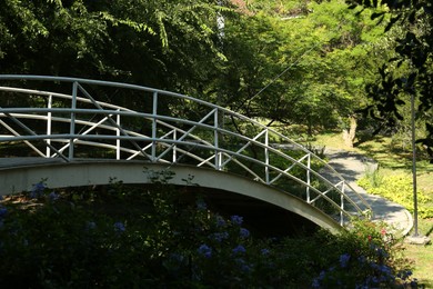 Photo of Beautiful bridge in park on sunny day
