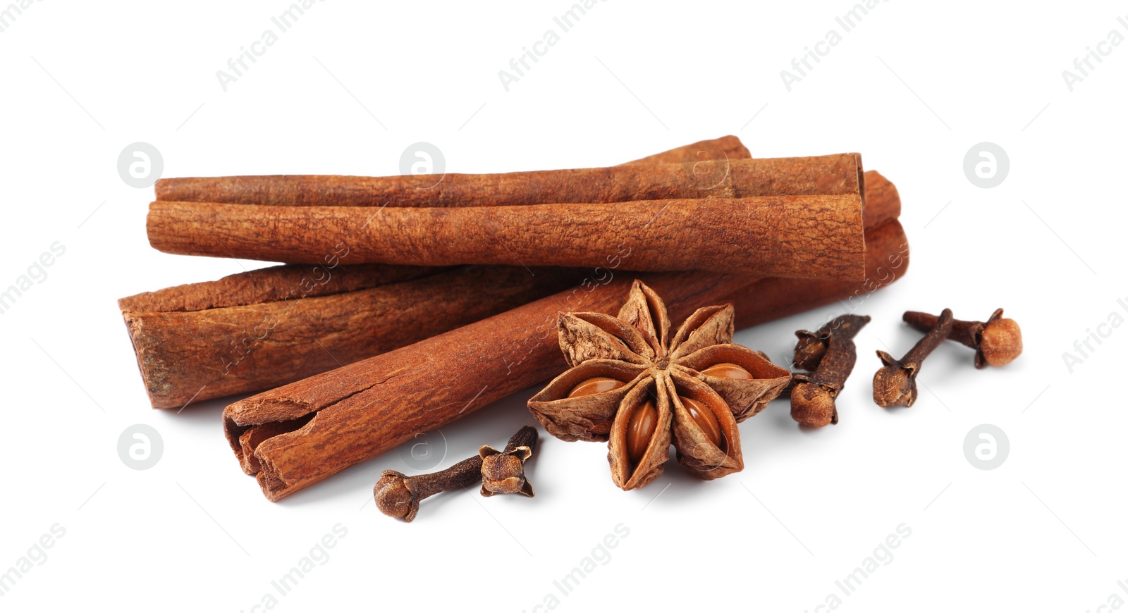 Photo of Many different aromatic spices on white background