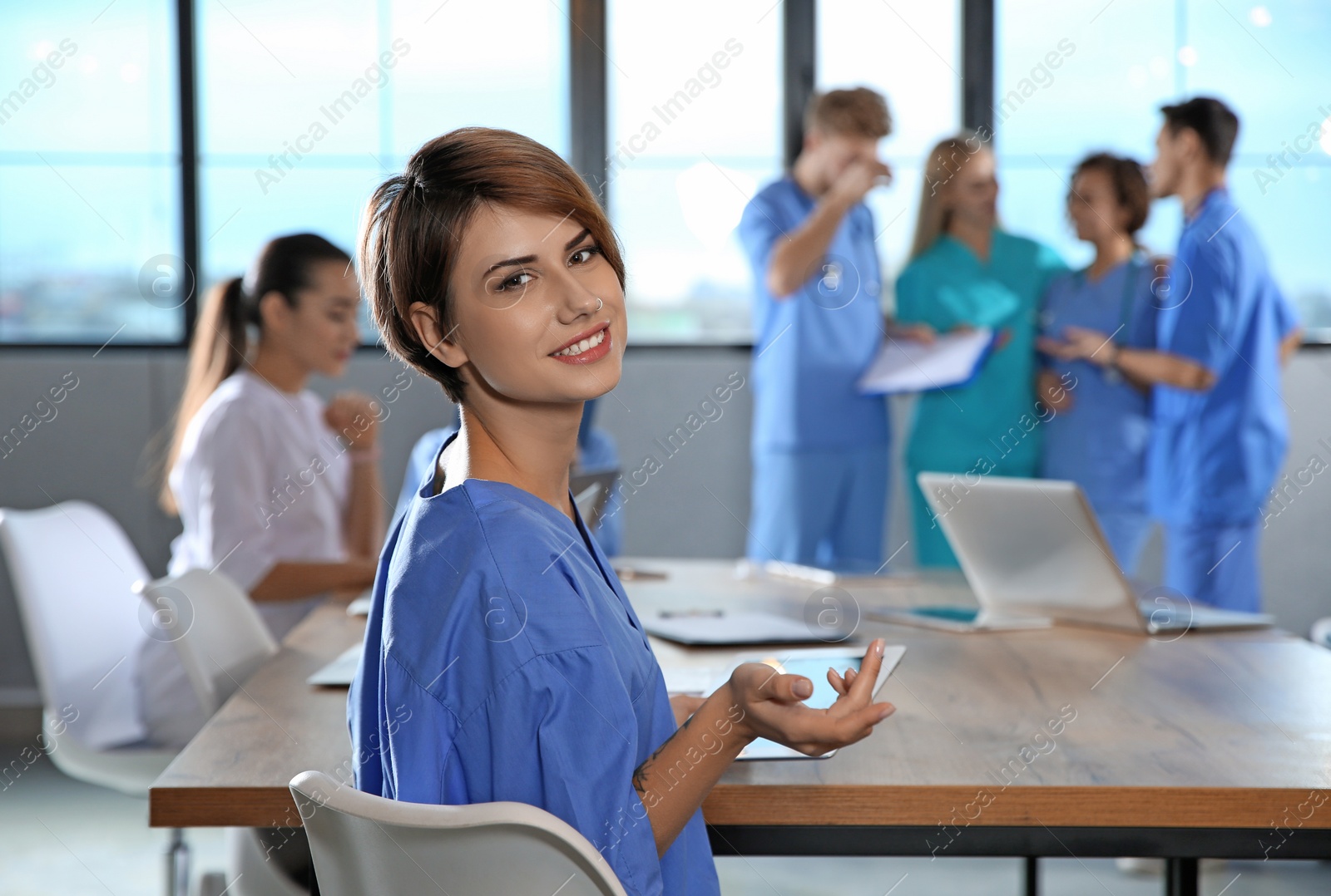 Photo of Smart medical student with her classmates in college