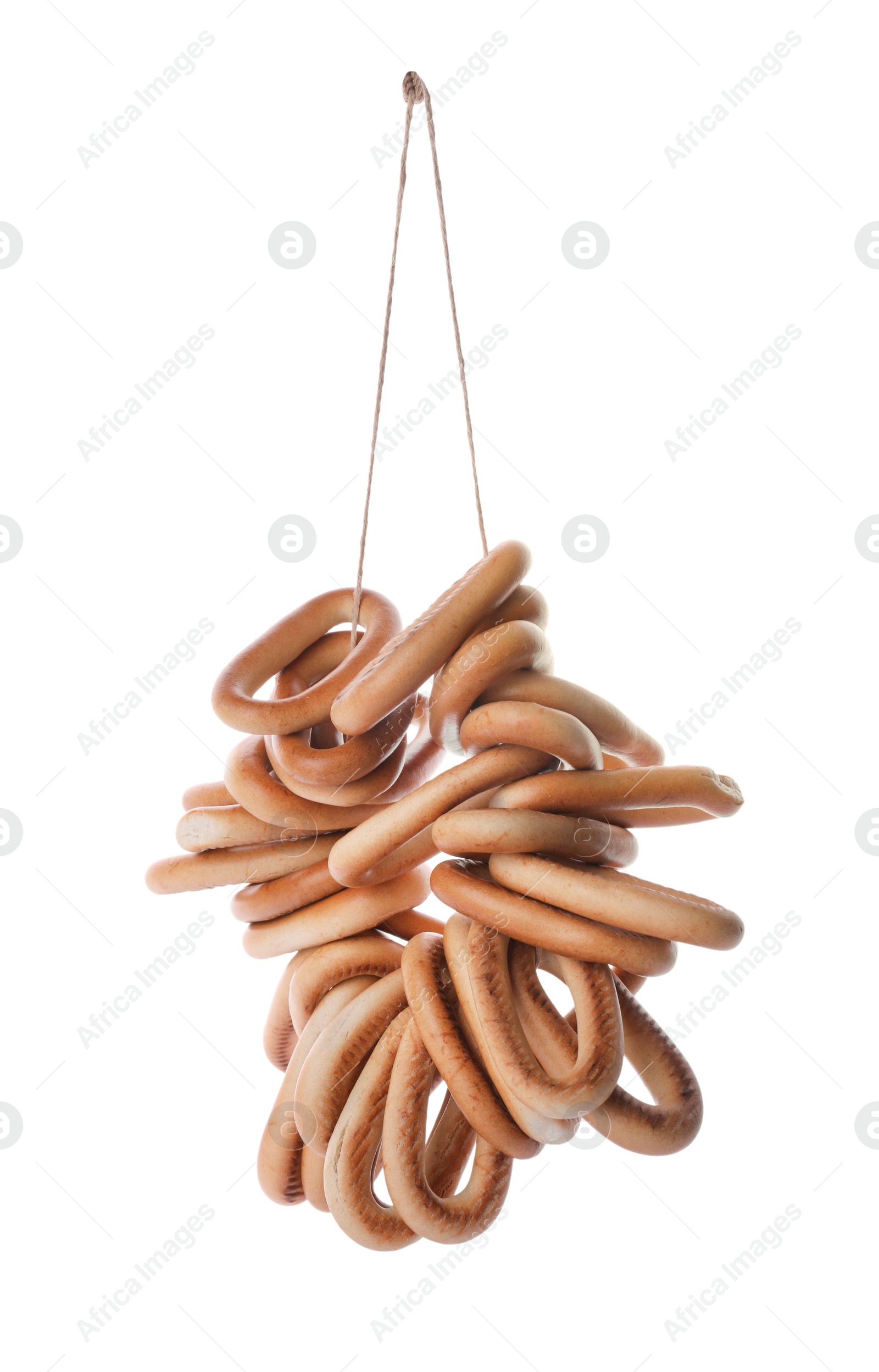 Photo of Bunch of delicious ring shaped Sushki (dry bagels) on white background