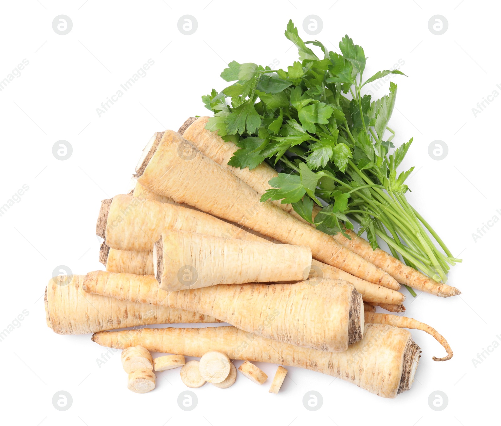 Photo of Raw parsley roots and bunch of fresh herb isolated on white, top view