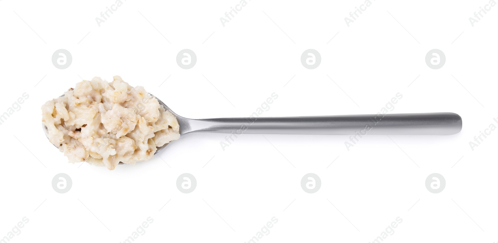 Photo of Spoon with oatmeal isolated on white, top view