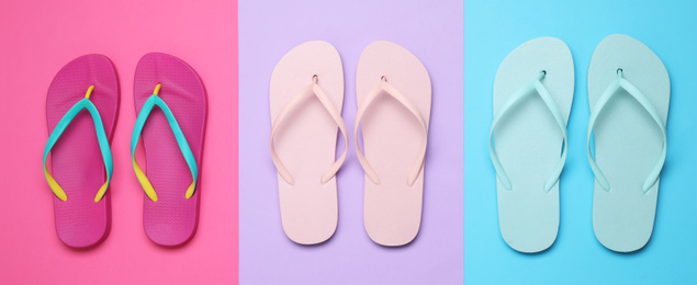 Photo of Flat lay composition with flip flops on color background. Beach objects