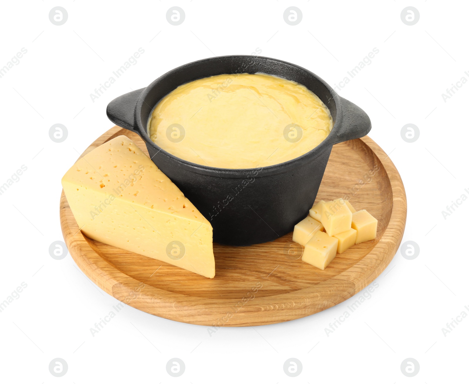 Photo of Fondue with tasty melted cheese and pieces isolated on white