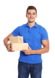 Happy young courier with parcels on white background