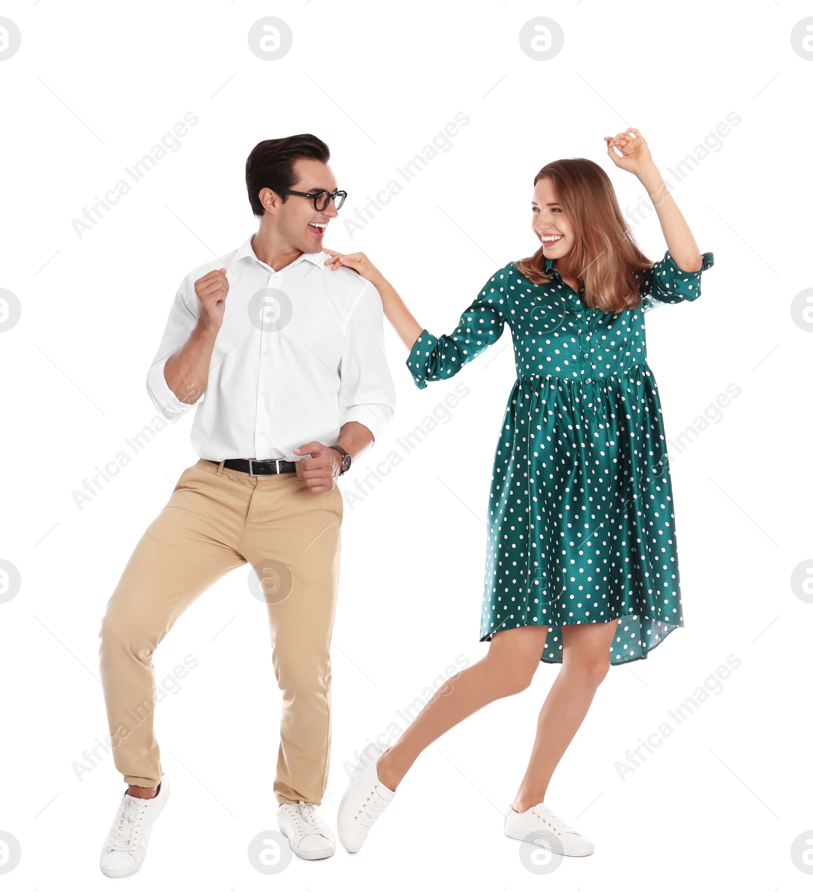 Photo of Beautiful young couple dancing on white background