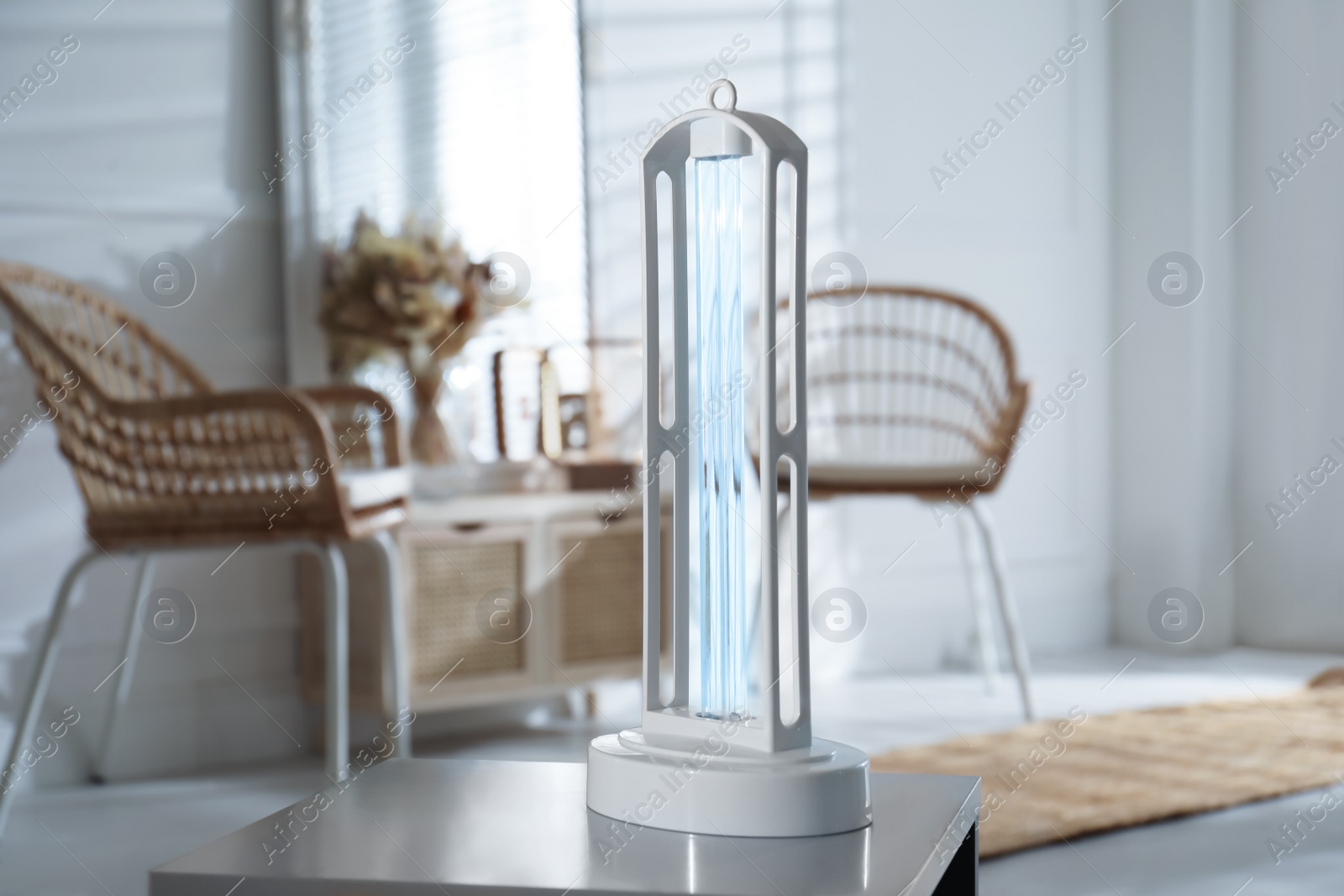 Photo of UV sterilizer lamp on table at home