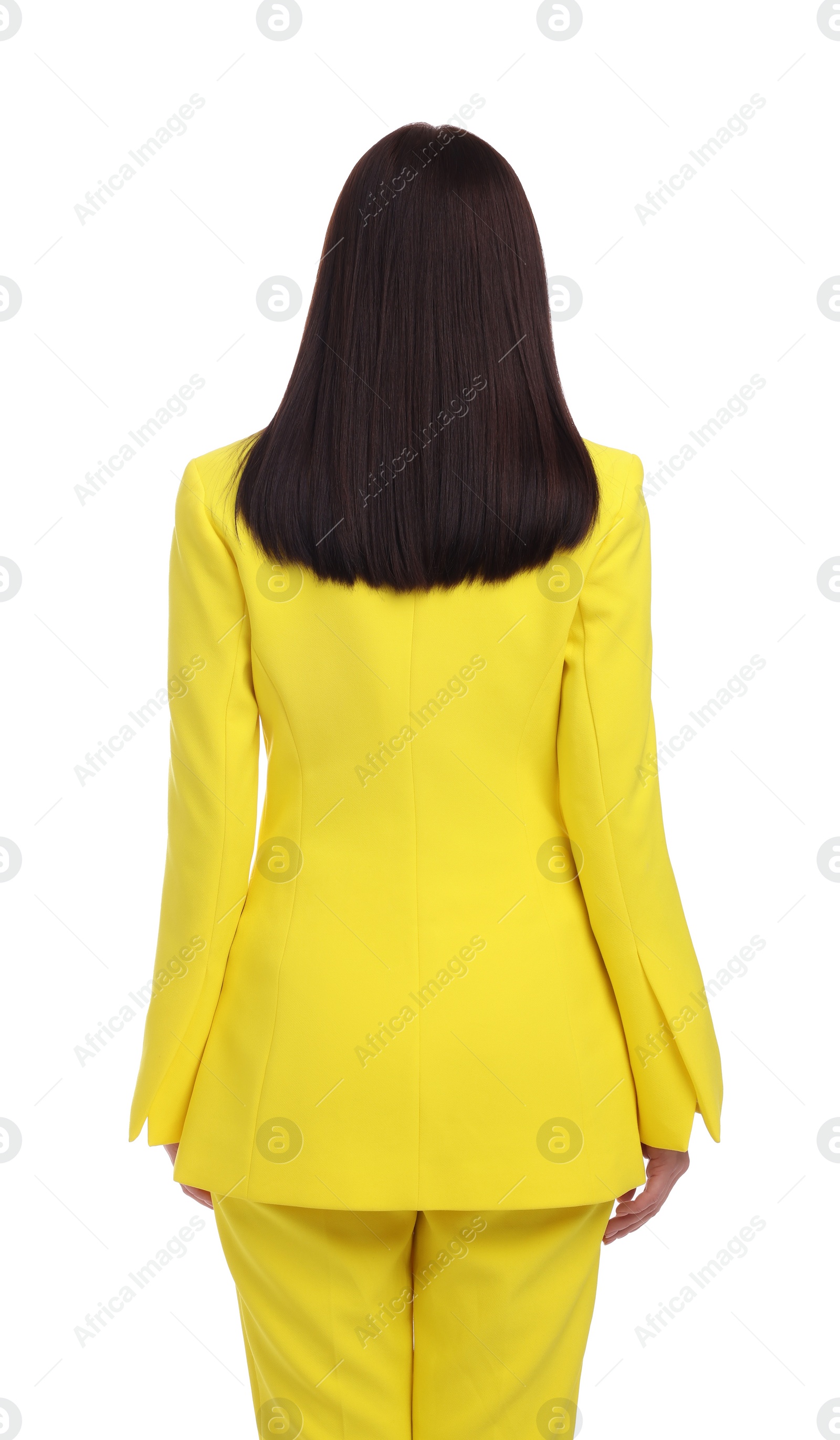 Photo of Businesswoman in yellow suit on white background, back view