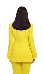 Businesswoman in yellow suit on white background, back view