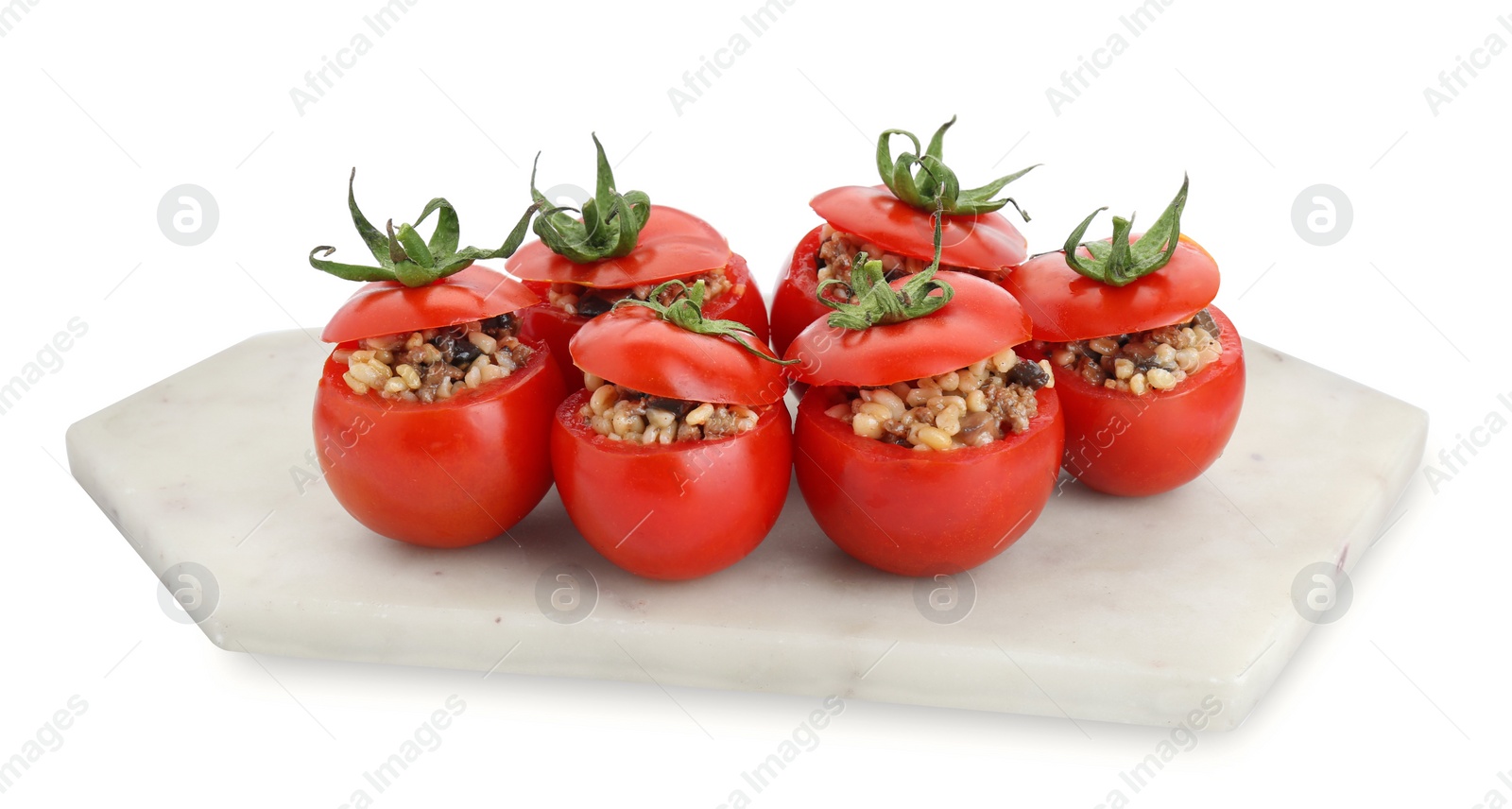 Photo of Delicious stuffed tomatoes with minced beef, bulgur and mushrooms isolated on white