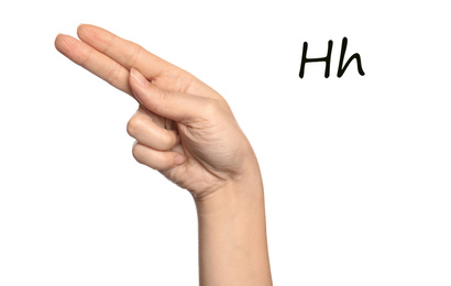 Image of Woman showing letter H on white background, closeup. Sign language