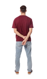 Young man in casual clothes posing on white background