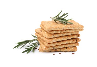 Photo of Stack of cereal crackers with flax, sesame seeds and rosemary isolated on white